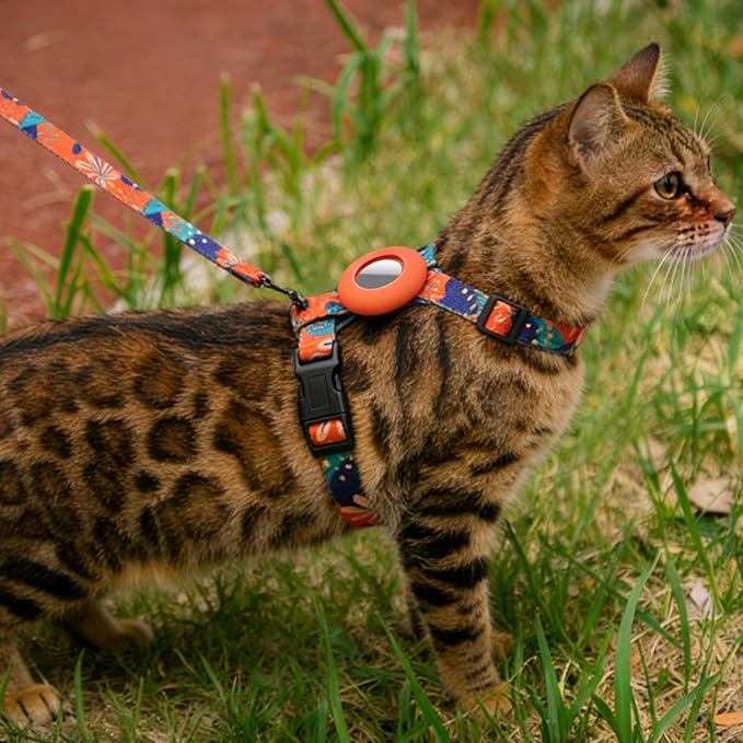 Cat Harness and Leash Set with Airtag Holder for Walking & Travelling, Escape Proof Cat Harness for Small Medium Large Kitten, Adjustable Lightweight Soft Cat Vests(Orange Print)