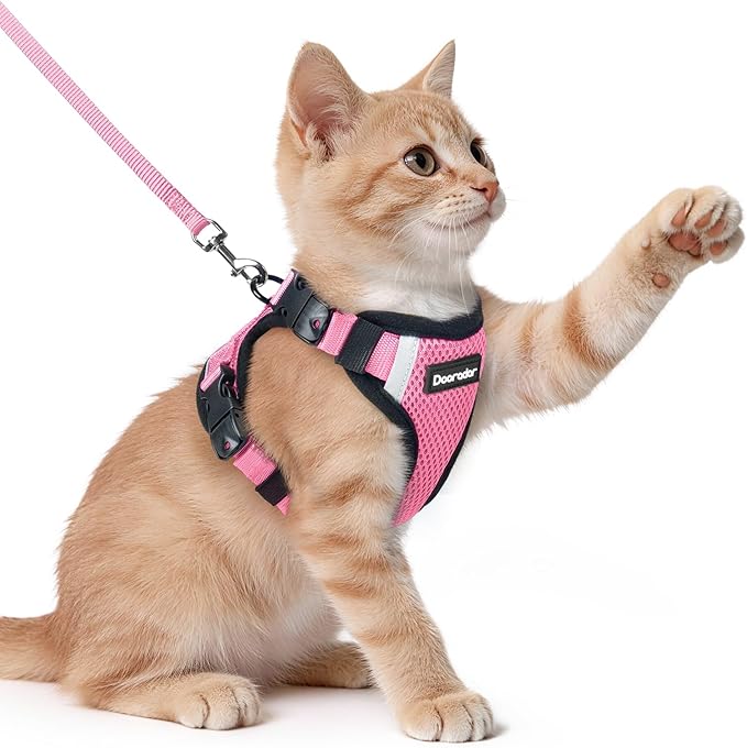 Dooradar Cat Harness and Leash Set, Escape Proof Soft with 3 Adjustable Buckles, Comfortable Vest Easy to Wear Kitten Harness with Reflective Strip, Safe for Outdoor Walking, Pink, XS