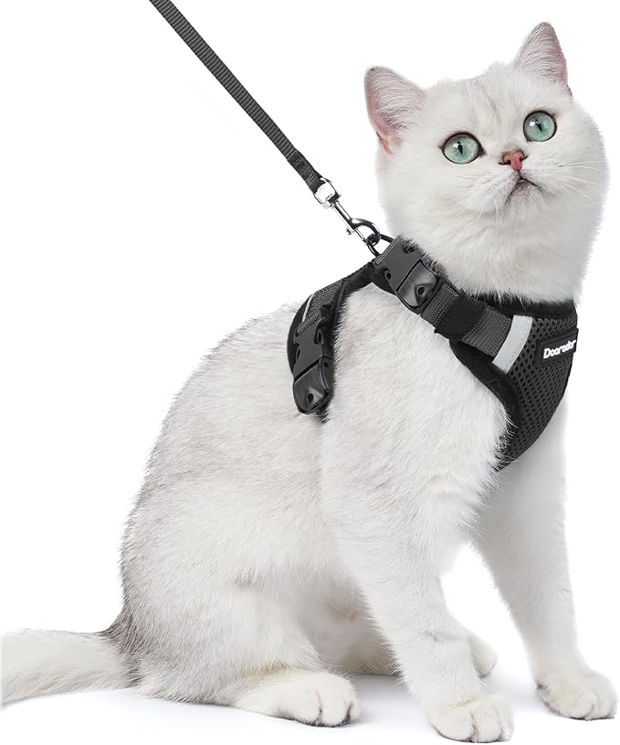 Dooradar Cat Harness and Leash Set, Escape Proof Soft with 3 Adjustable Buckles, Comfortable Vest Easy to Wear Kitten Harness with Reflective Strip, Safe for Outdoor Walking, Black, S